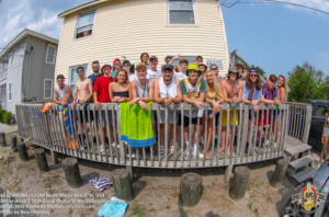Big Senior Week crew posing on the deck of a North Myrtle Beach rental
