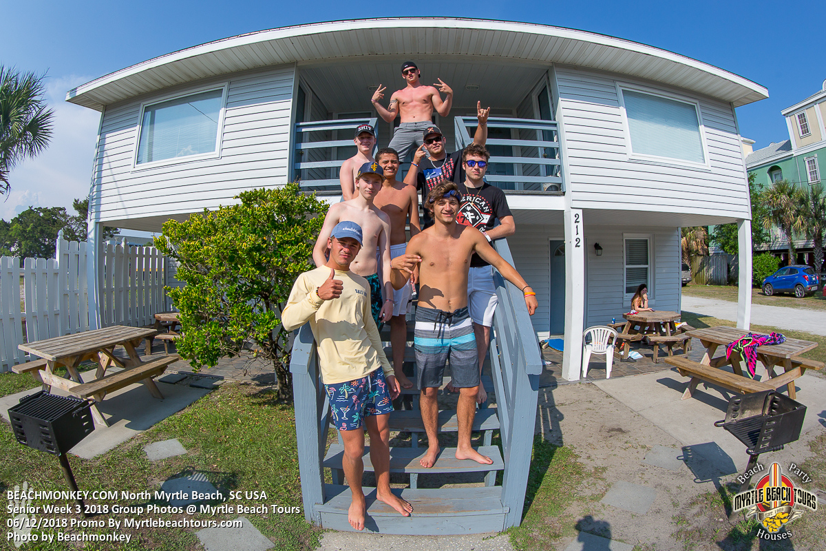 Senior Week friends posing on the steps of a North Myrtle Beach cottage