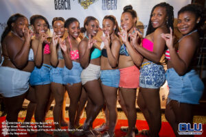 Friends posing together at a Myrtle Beach Senior Week theme party
